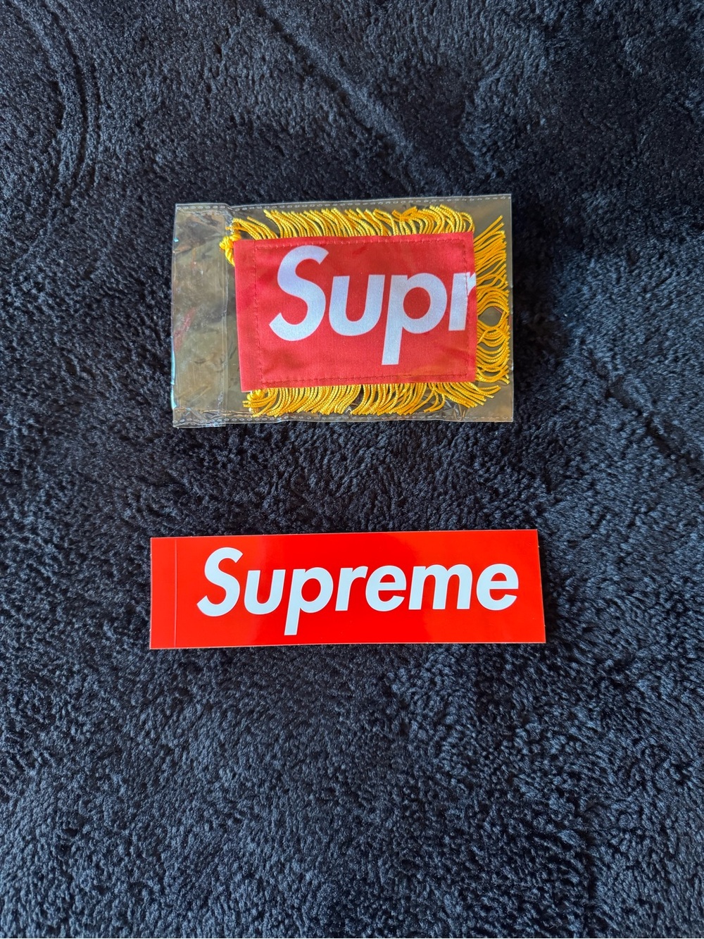 Supreme Hanging Flag FW26 and Red Sticker